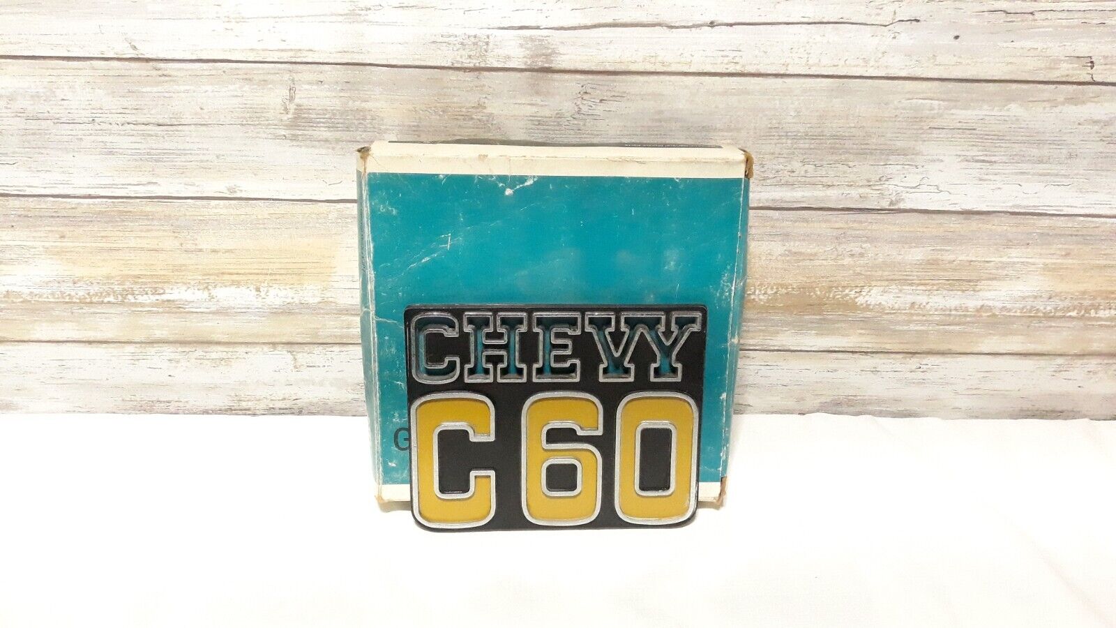 NOS 1973-80 Chevy C60 Fender Emblem Original GM Box 692915 (No Mounting Studs)