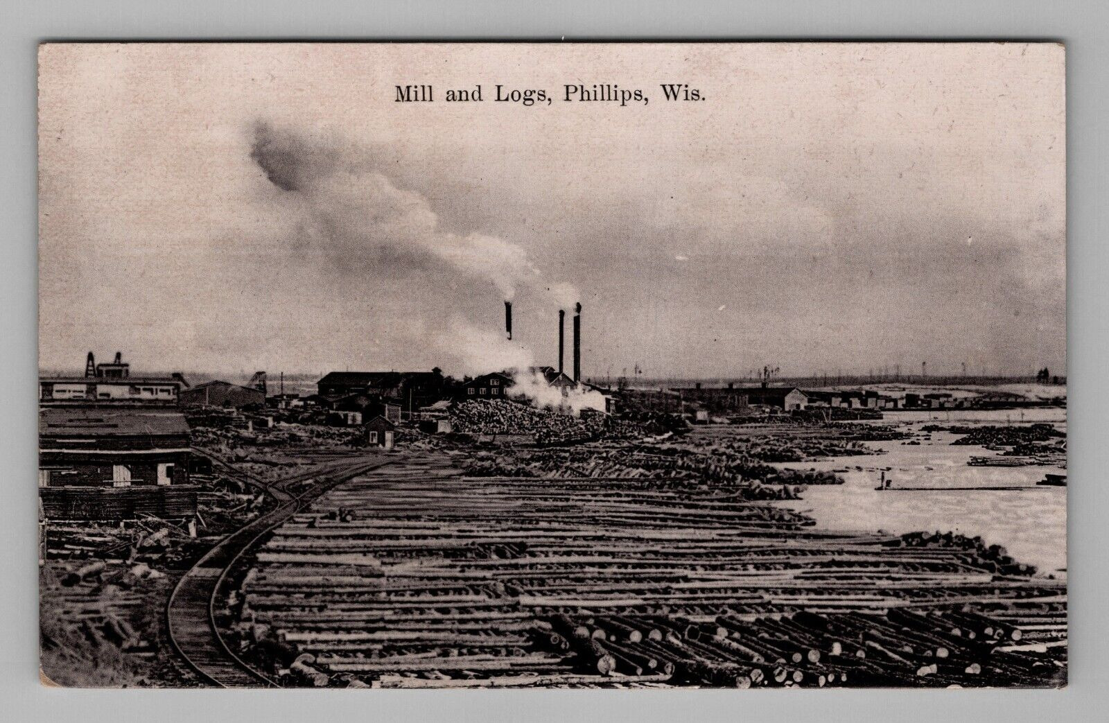 Postcard Phillips Wisconsin RPPC Logging Mill Smoke Stacks Real Photo WI 1908