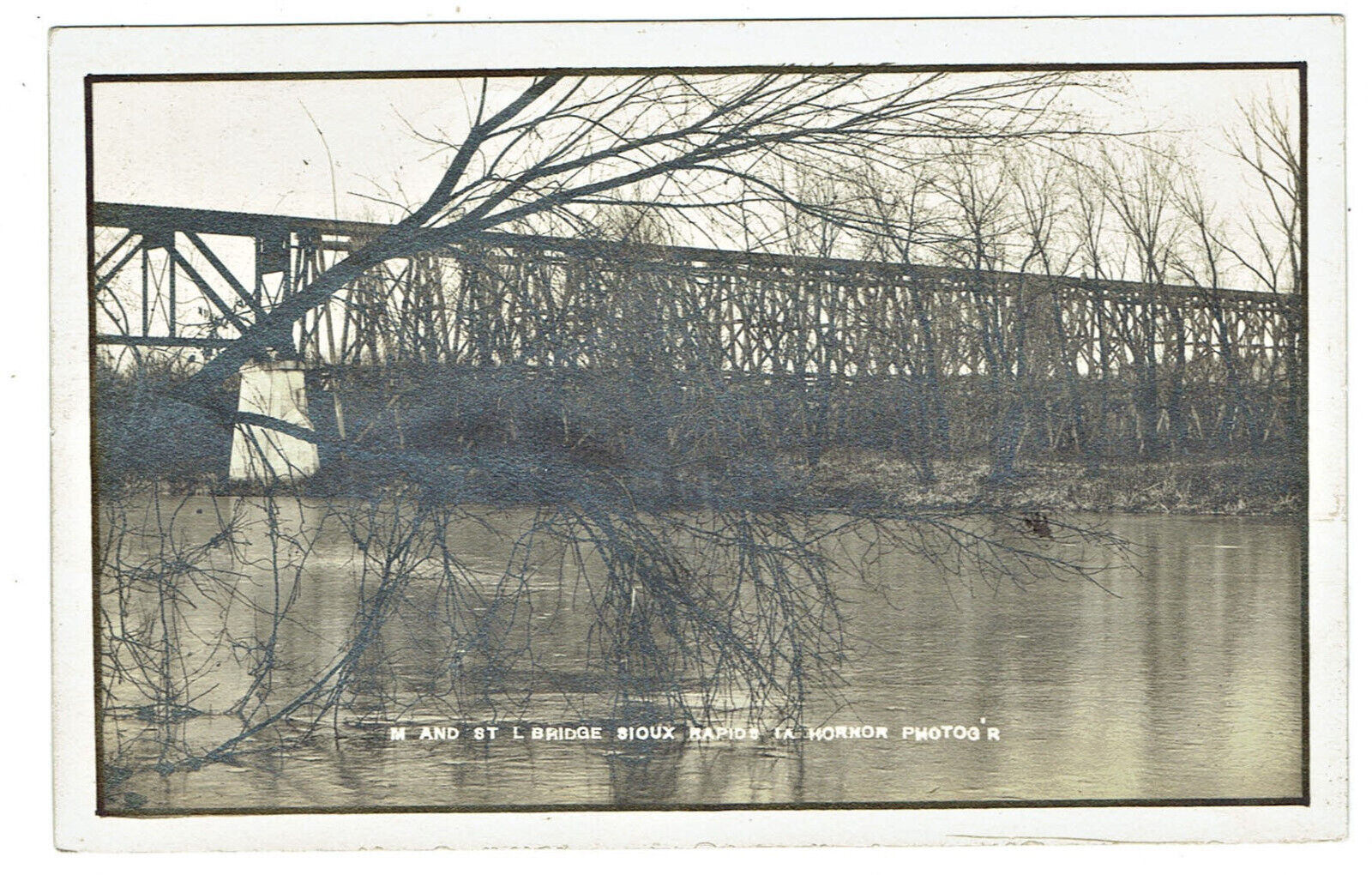 Sioux Rapids Iowa RPPC of the Minneapolis & St Louis Railroad Bridge posted 1911