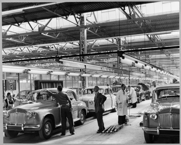 An interior view of the Rover factory in Solihull, showing workers - Old Photo