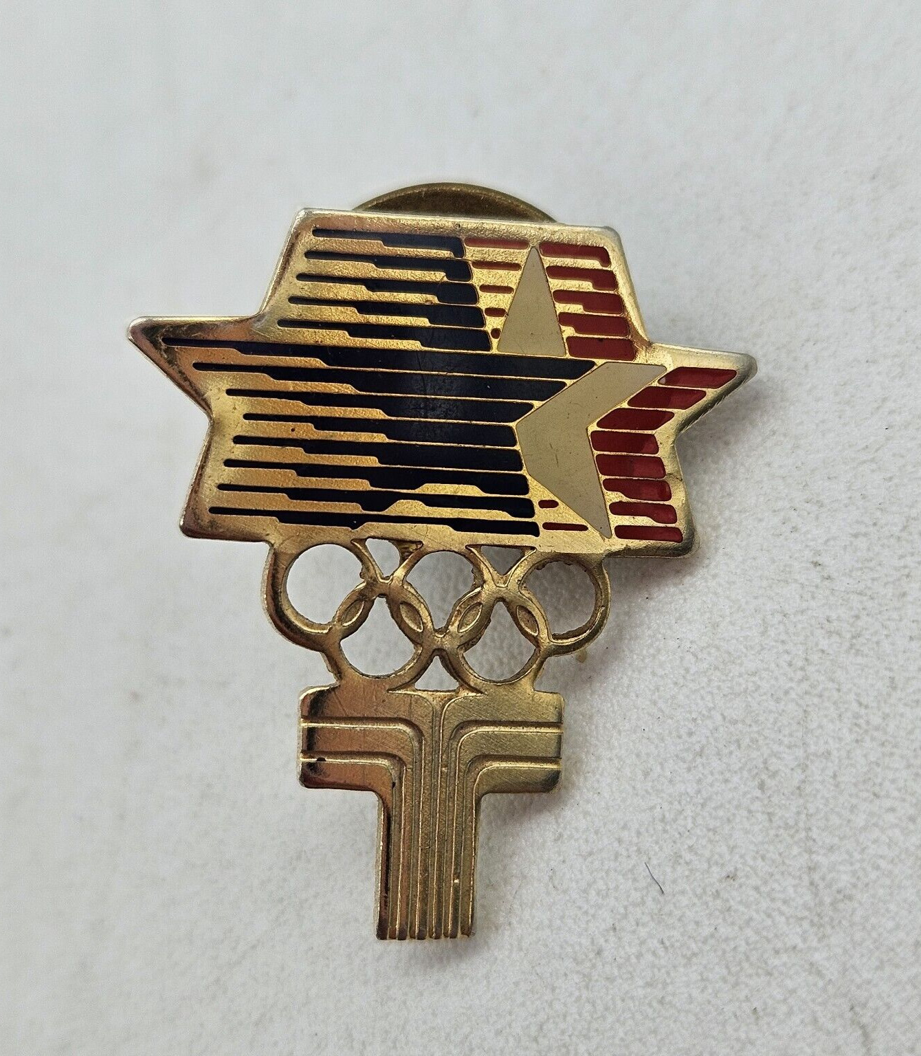 Vintage Enamel Tie Back 1984 LA Olympics Transamerica Insurance Logo Pin