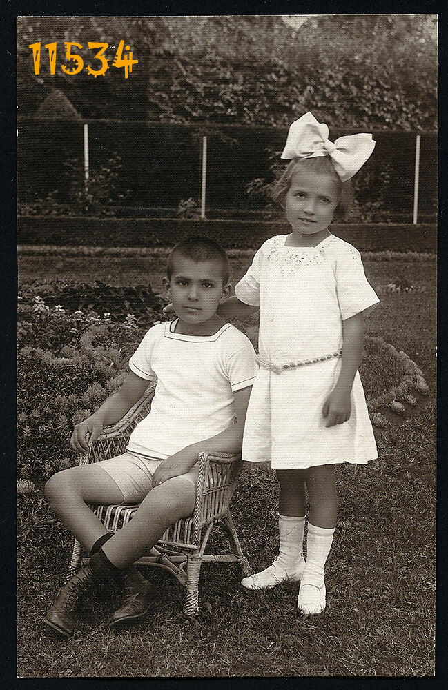 Vintage Photograph, sweet girl and boy in garden, big bow, by Feldmann 1920\'s