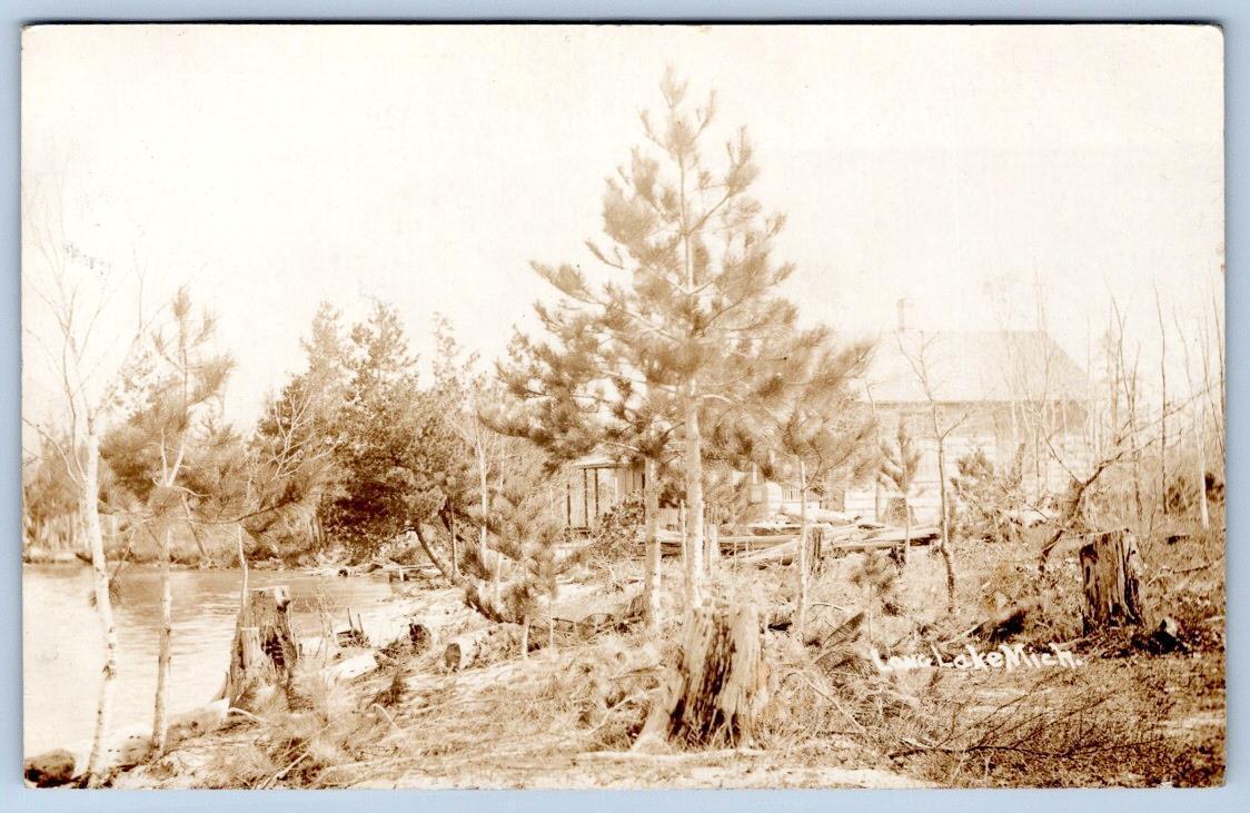 1911 RPPC LONG LAKE MICHIGAN CABIN IN WOODS SHORELINE REAL PHOTO POSTCARD