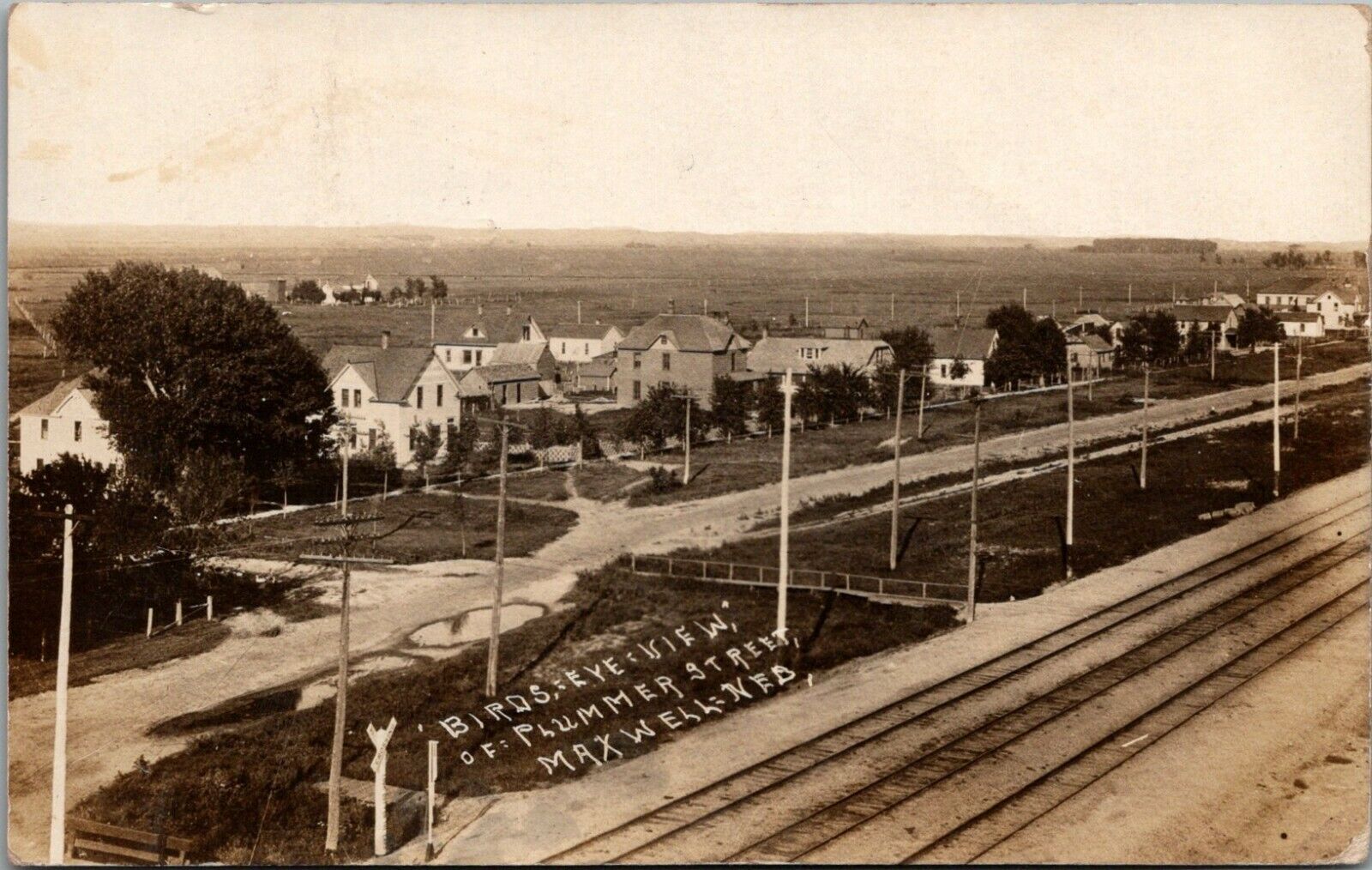 Maxwell Nebraska~Plummer Street Across Railroad Tracks~Homes~Farm~1913 RPPC