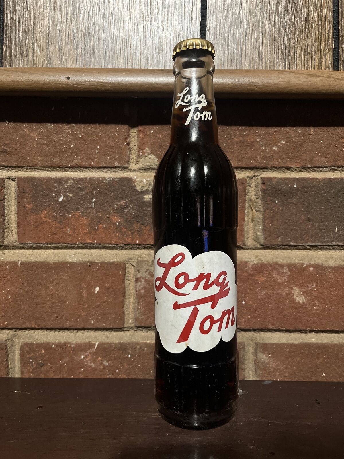 Full 10 Oz. Long Tom Root Beer Soda Bottle