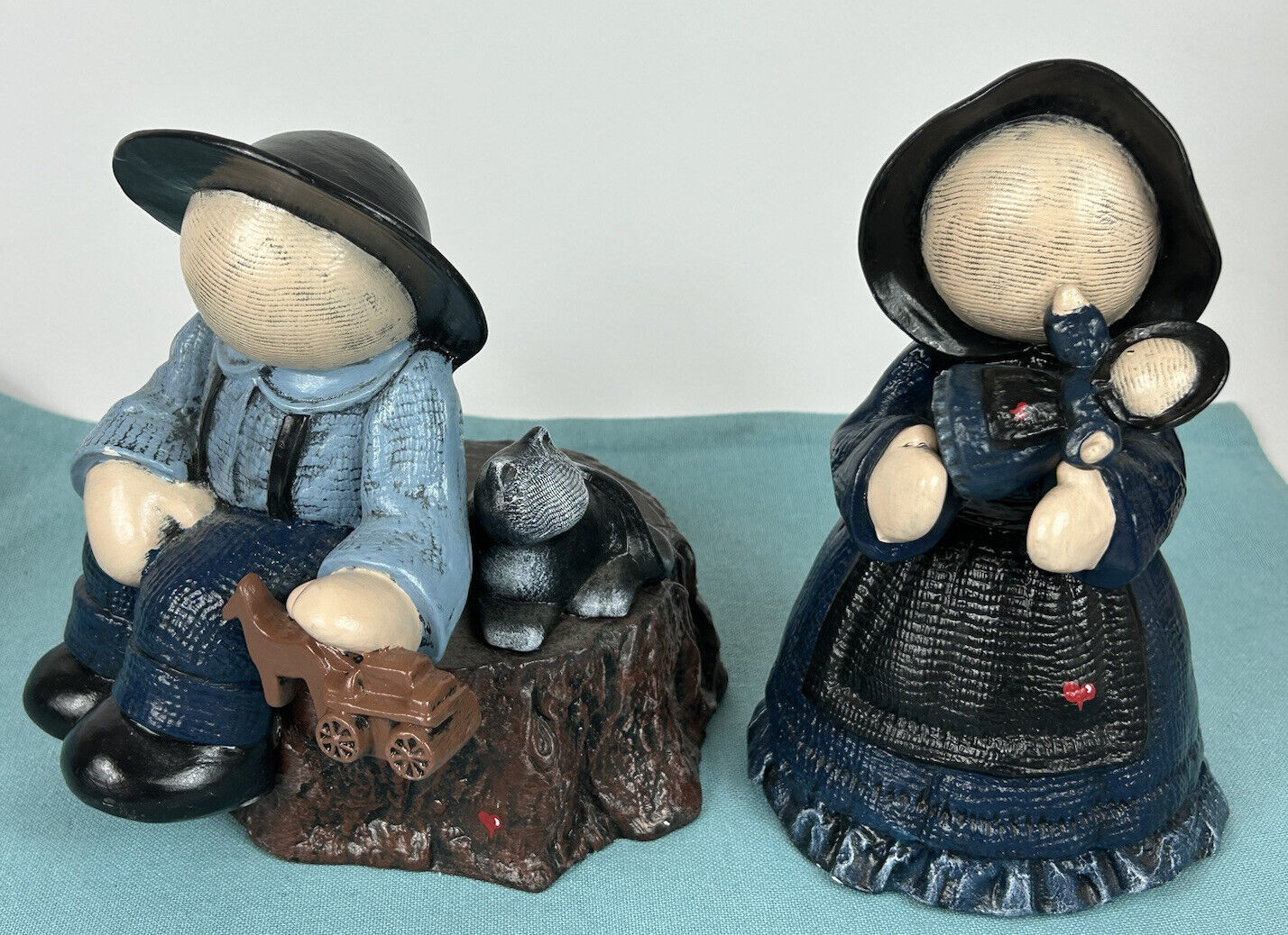 2- Amish Faceless Figurines Couple Man Woman Holding Baby 