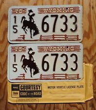 One or More -MINT 1978 WYOMING Cowboy Horse Fence Brown License Plate SET / PAIR picture
