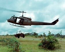 UH-1D Huey Helicopter hauling an Army “Mule