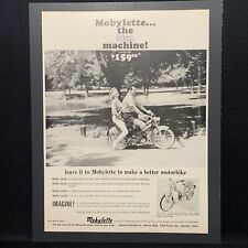 Vintage 1965 Mobylette motorbike advertisement picture