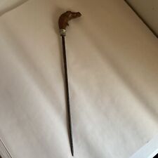 Articulated lizard head metal pointing stick￼ picture