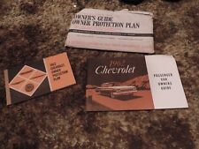 1962 Chevy Owners Guide (1st ed),Protection plan (2nd ed) & paper holder picture