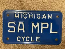 Vintage Blue Michigan MOTORCYCLE License Plate SAMPLE - UNUSED - RARE picture