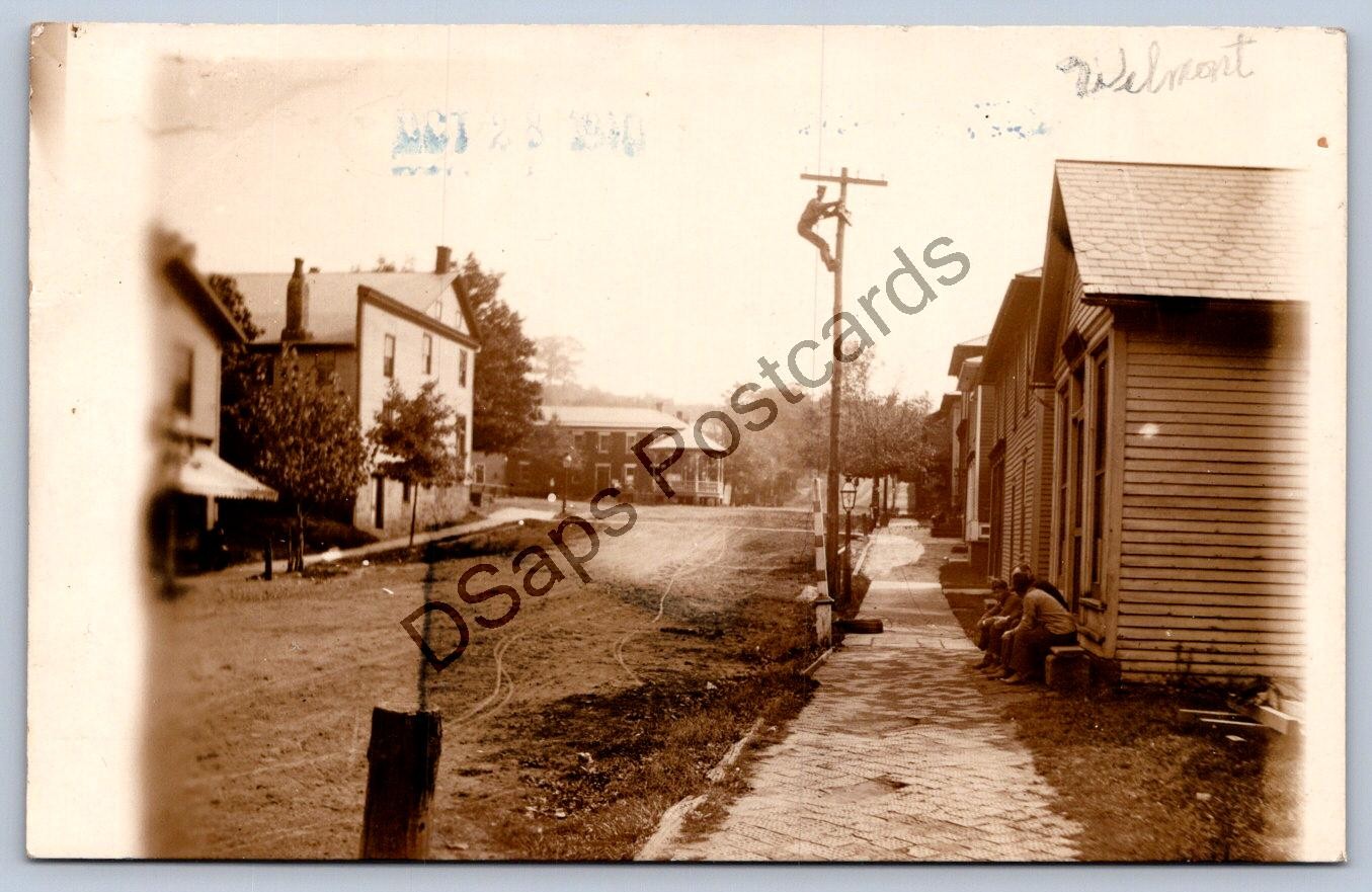 K64/ Wilmot Ohio RPPC Postcard 1910 Man Telephone Co Pole Stores 280