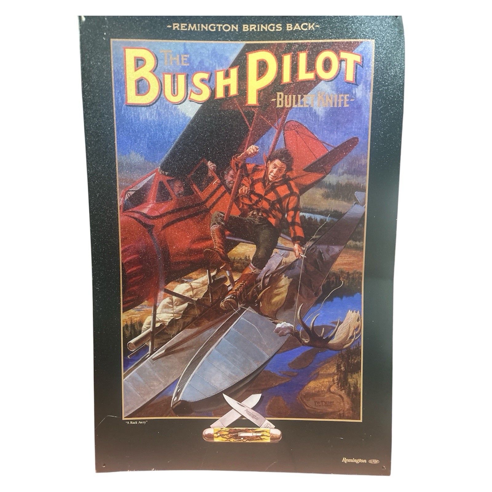 REMINGTON BUSH PILOT Bullet Knife Tin Sign A Rack Awry' LW DUKE 1992