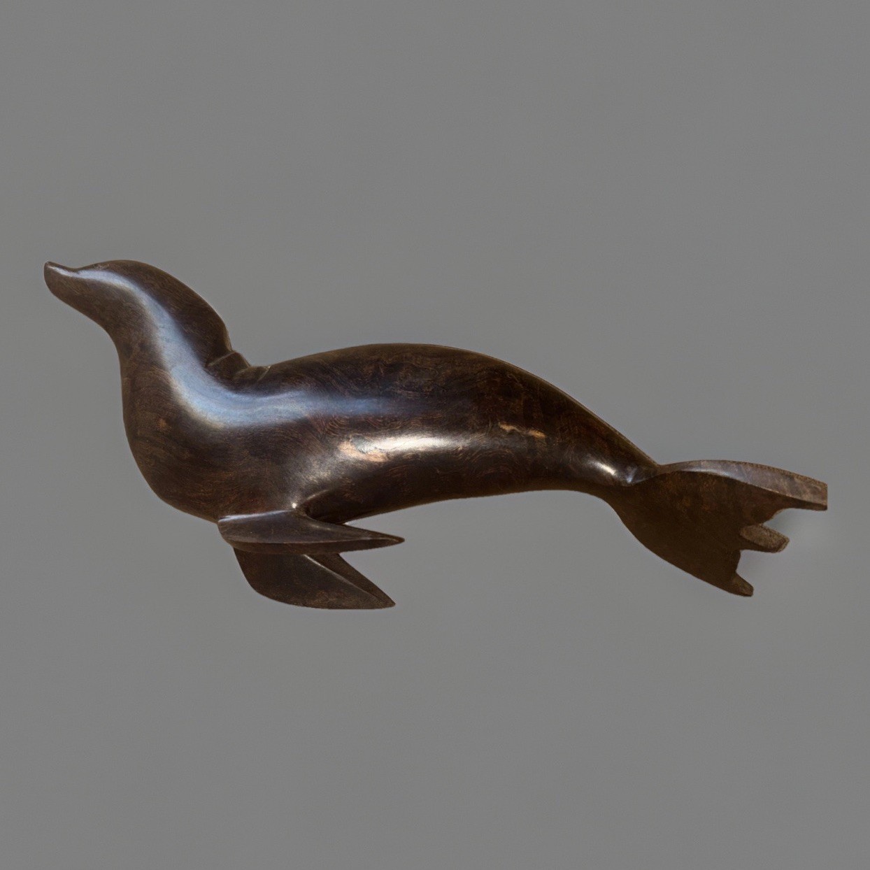 vintage hand-carved ironwood sculpture with a polished, dark brown 12”