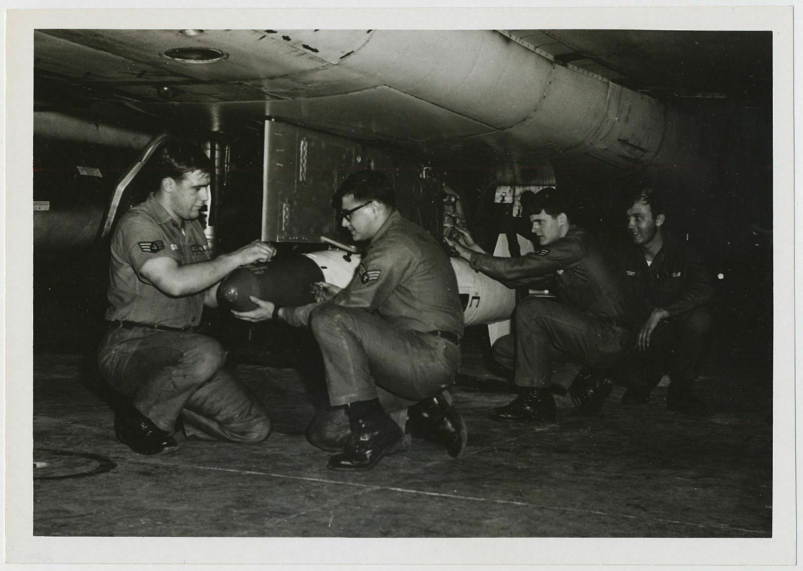 Loading a Bomb onto a US Air Force F-100 A/C Bomber 1960\'s
