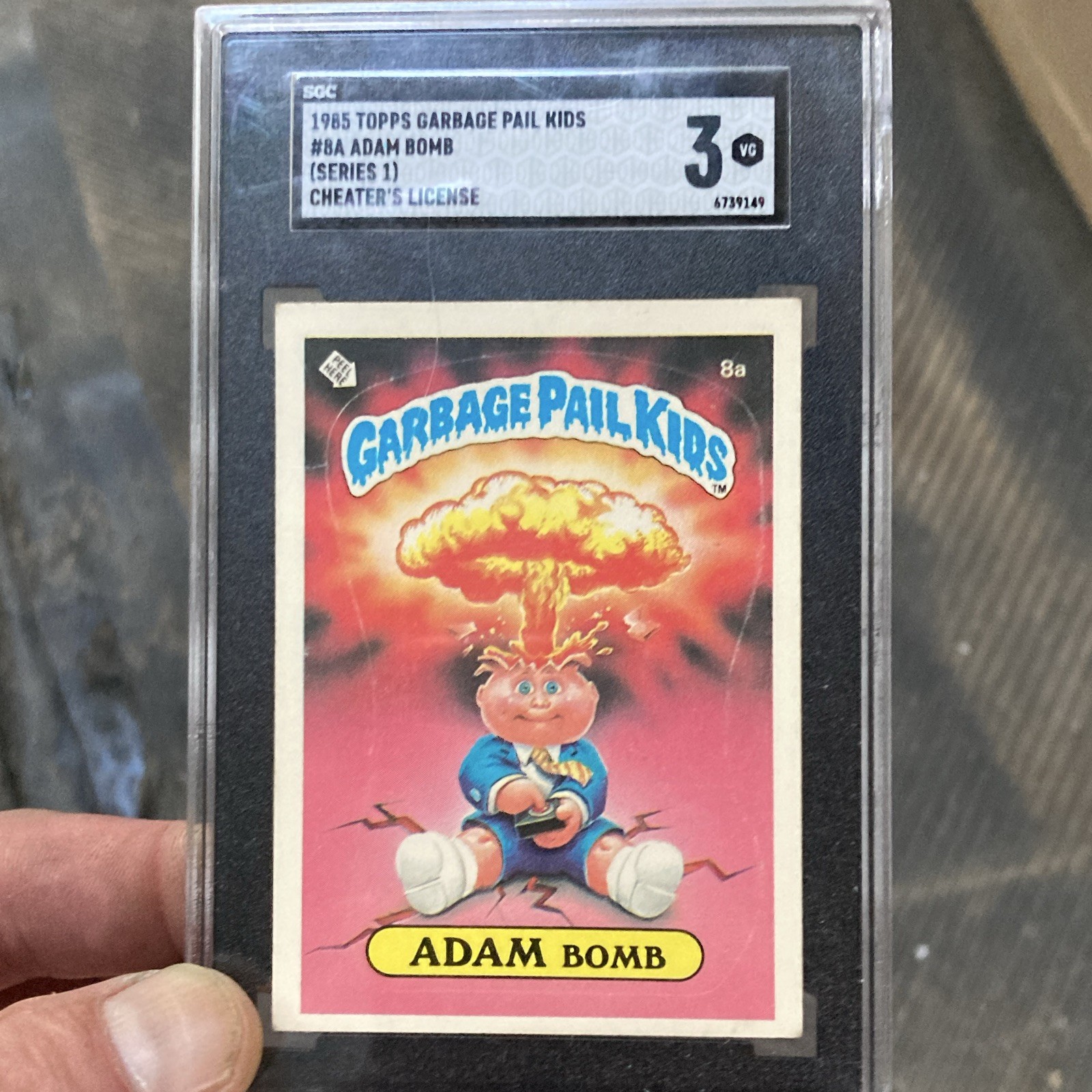 Topps 1985 Garbage Pail Kids Series 1 #8a Adam Bomb Cheater's License