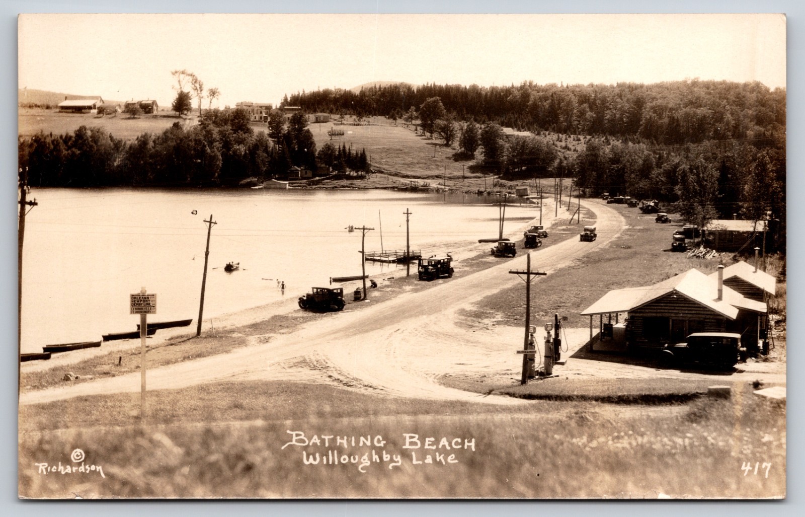 Bathing Beach at Willoughby Lake Vermont, Cars Parked, Gas Station RPPC