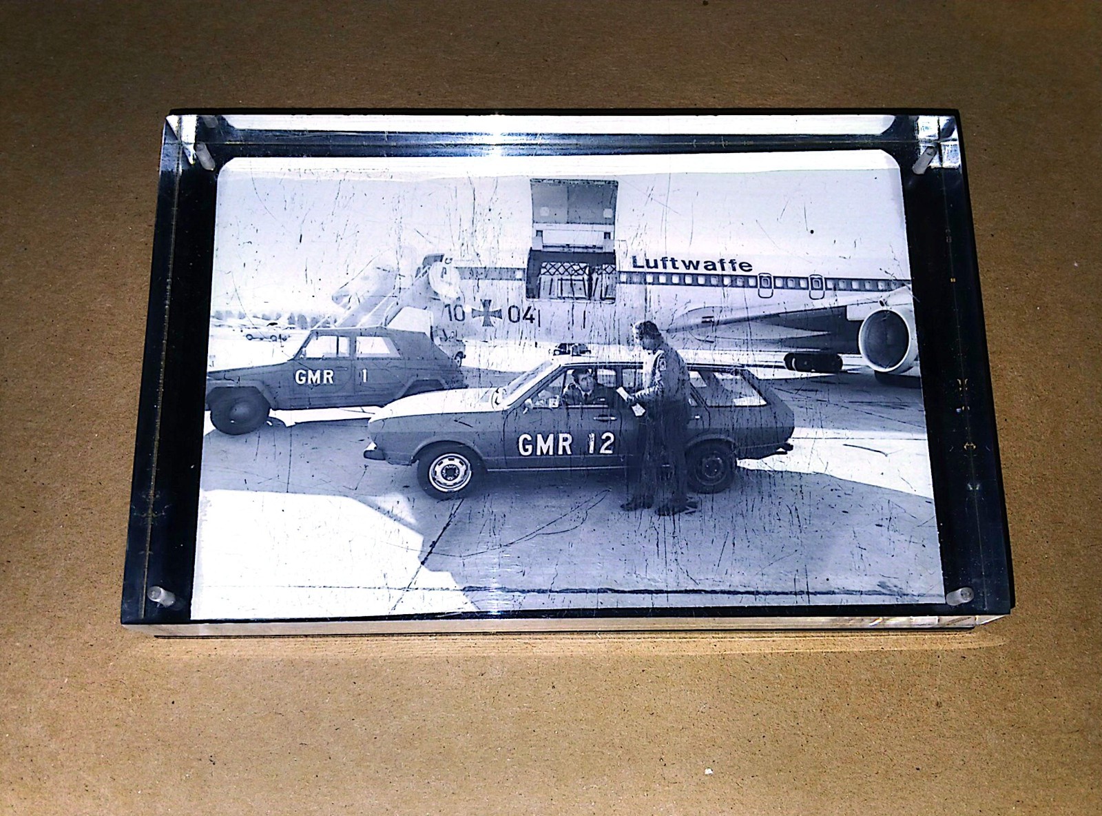 Vintage Photograph Luftwaffe Airplane GMR Vehicles Encased In Acrylic 1970s