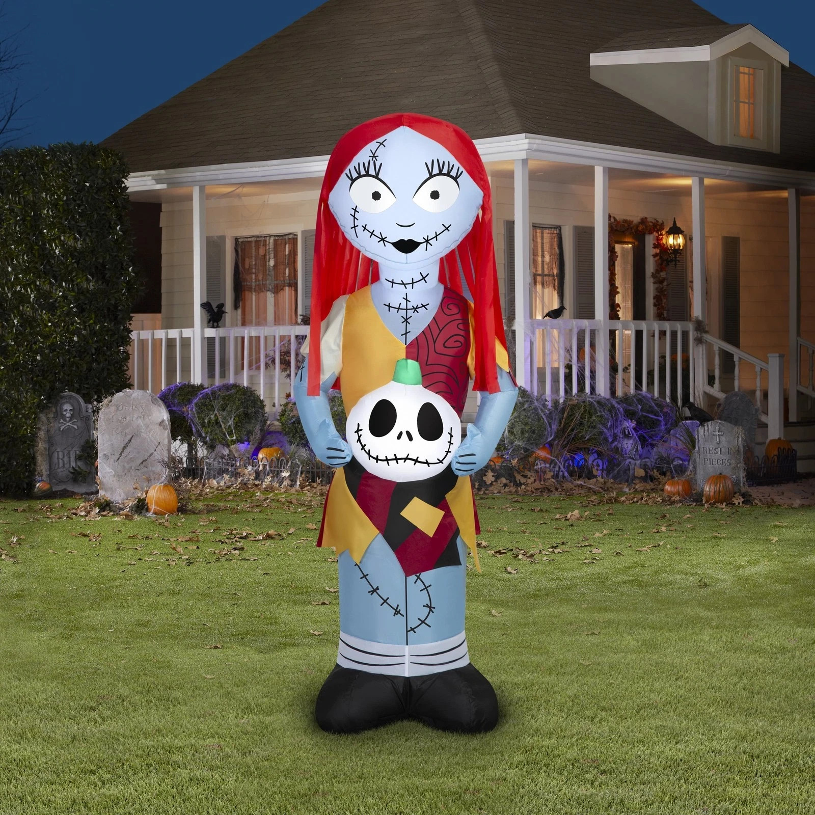 Disney 5 ft. Inflatable Light Sally in Orange Dress with Skull Halloween Décor