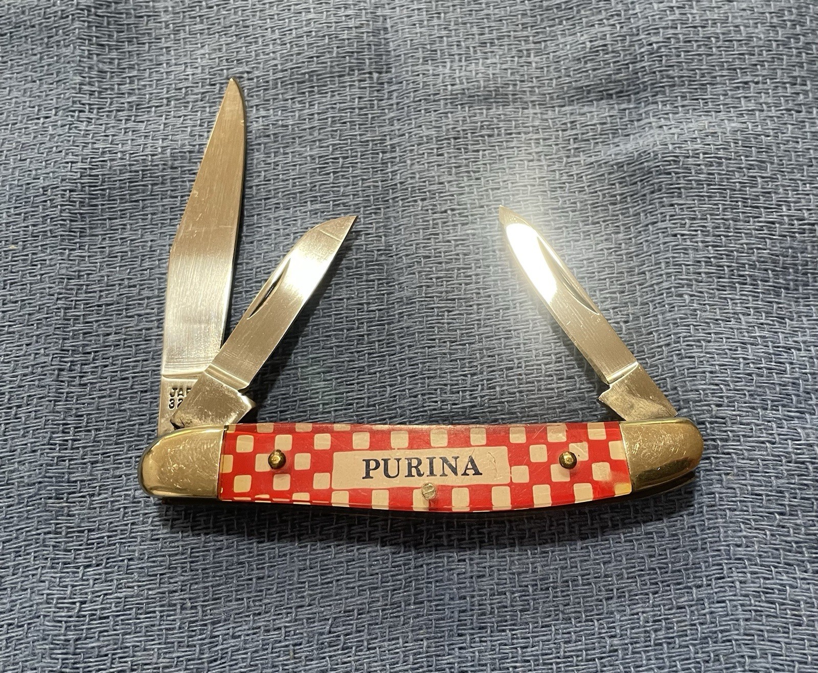 UTICA PURINA  JAPAN 32148 ADVERTISING POCKET KNIFE