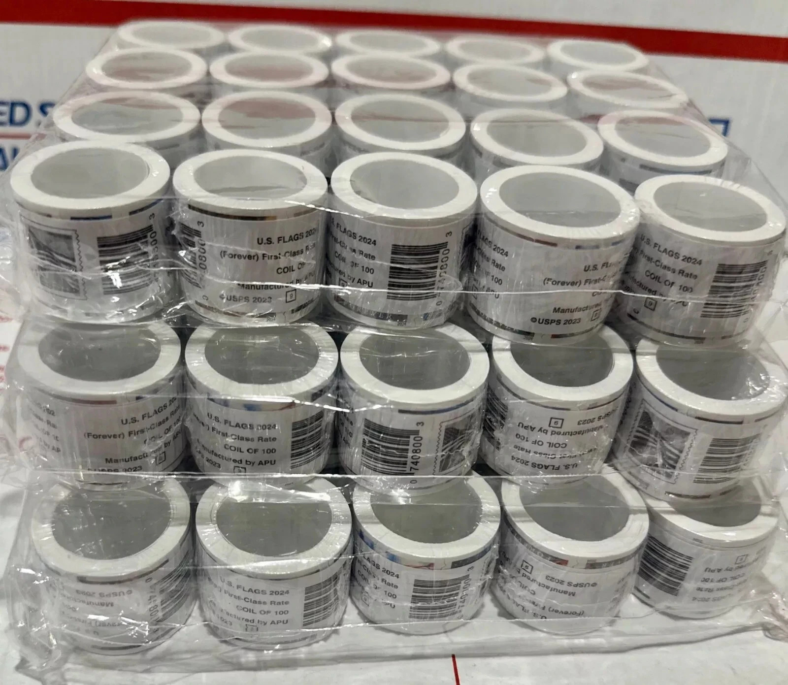 5 rolls of 100 USPS postage stamps, totaling 500 pieces