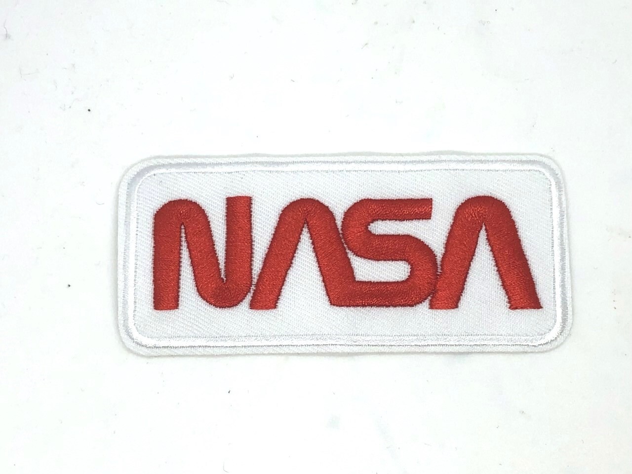 NASA Worm white embroidered Patch iron/sew on 4 x 1.75 inches NASA Worm white embroidered Patch iron/sew on 4 x 1.75 inches