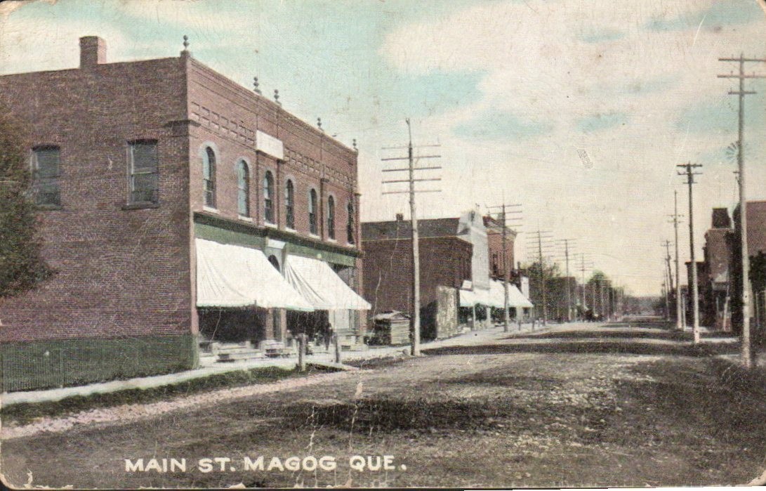 Magog Quebec - Main Street Stores and Awnings - Antique Postcard - circa 1910