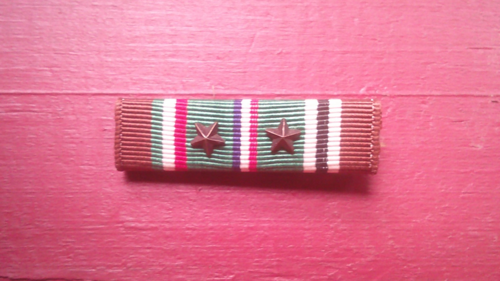 World War 2 European, African, Middle East ribbon with pin back and 2 stars.