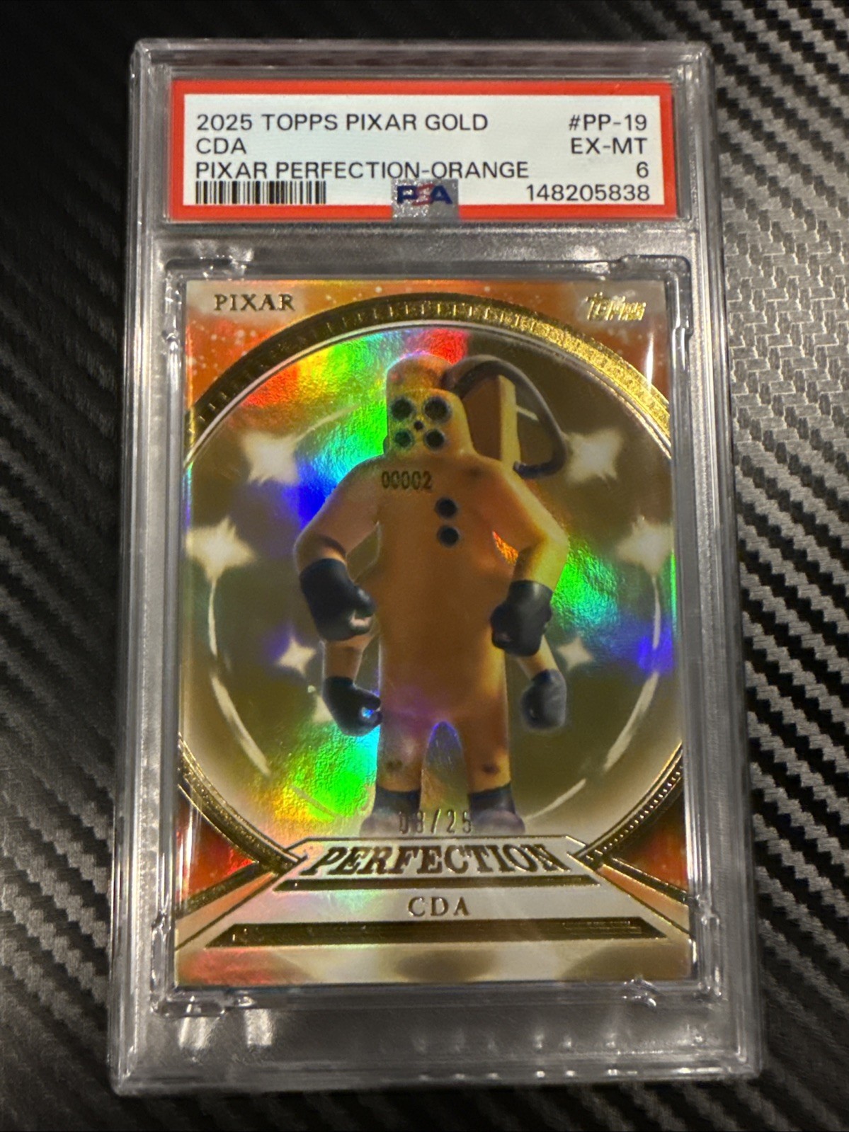 2025 Topps Pixar Gold CDA Pixar Perfection Orange /25 PSA 6