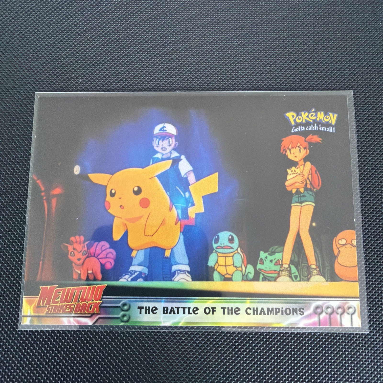 Topps 1999 Pokémon First Movie Trading Card #25 The Battle of the Champions