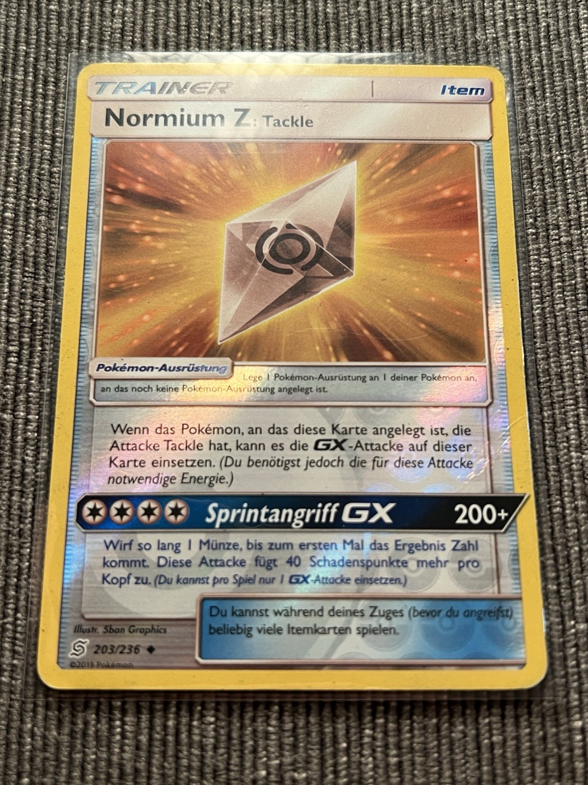 The Pokemon Company Pokemon TCG Normium Z: Tackle 203/236 German Holo GX 2019