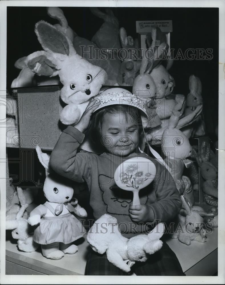 1963 Press Photo Jean Colley age 4 with a bunch of toy rabbits