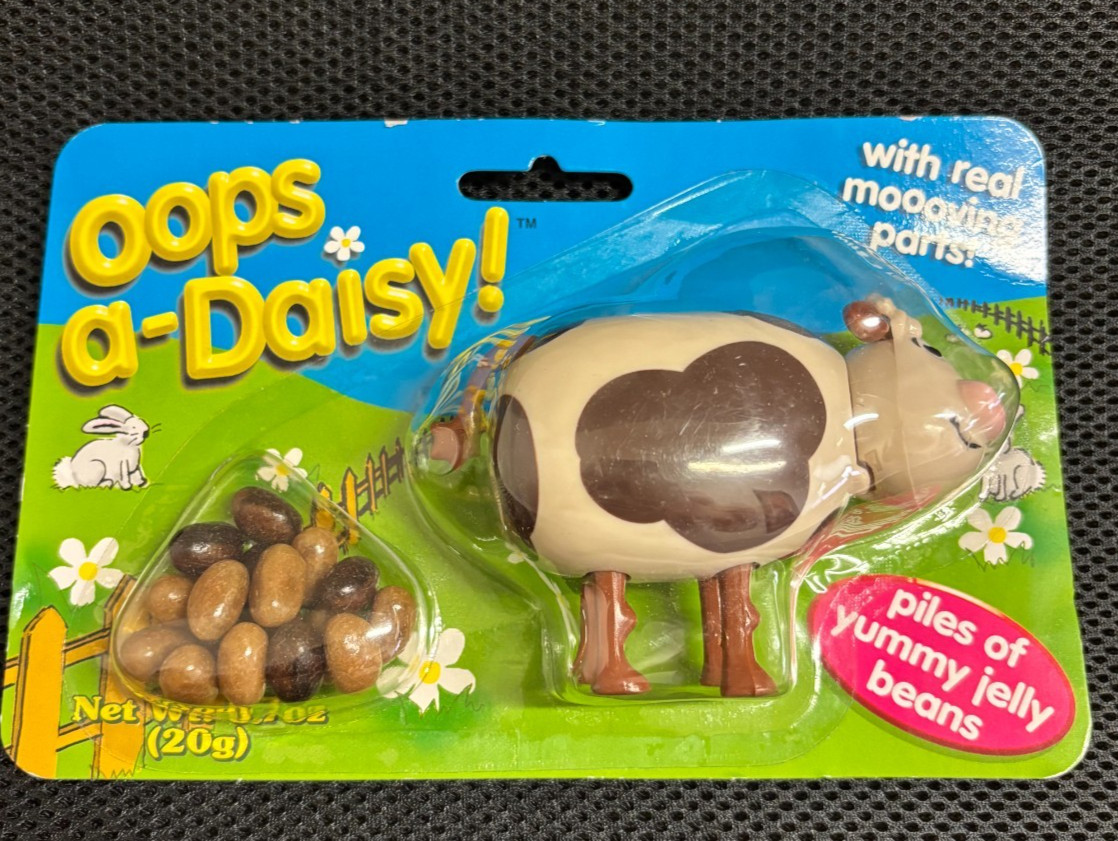 Vintage Oops A Daisy Jelly Bean Dispenser Cow Leaving Piles of Yummy Jelly Beans