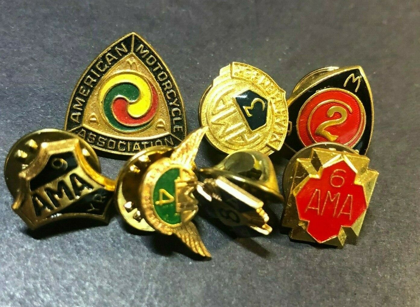 Group of 7 Vintage AMA American Motorcyclist Assc. Enameled Lapel Pins c1970\'s
