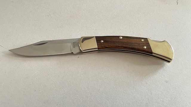 BUCK 110USA Hunting Pocket Knife Ebony Wood Handle Plain Blade Lockback - Great. BUCK 110USA Hunting Pocket Knife Ebony Wood Handle Plain Blade Lockback - Great.