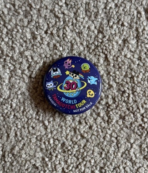 NYCC 2026 TAMAGOTCHI WORLD TOUR 30TH ANNIVERSARY PIN BUTTON BANDAI NAMCO RARE