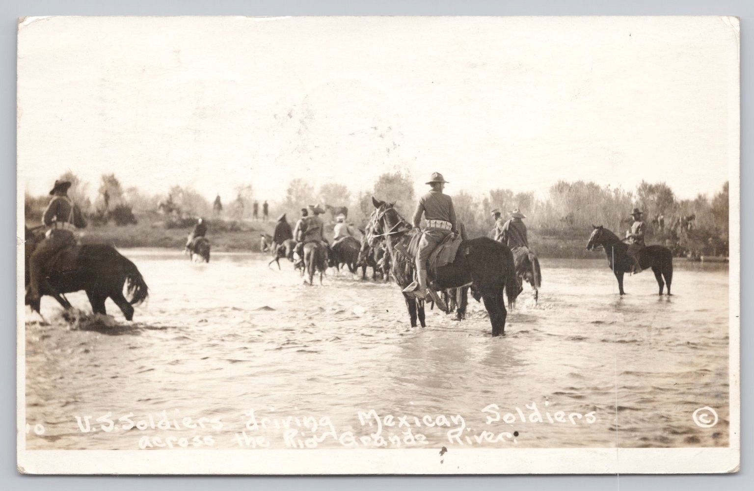1916 RPPC US Soldiers Driving Mexican Soldiers Horseback Rio Grande River Border 1916 RPPC US Soldiers Driving Mexican Soldiers Horseback Rio Grande River Border