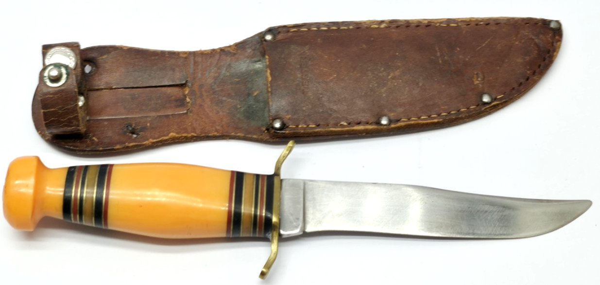 Kinfolks Incorporated Butterscotch Lucite/ Bakelite Handle Knife. 