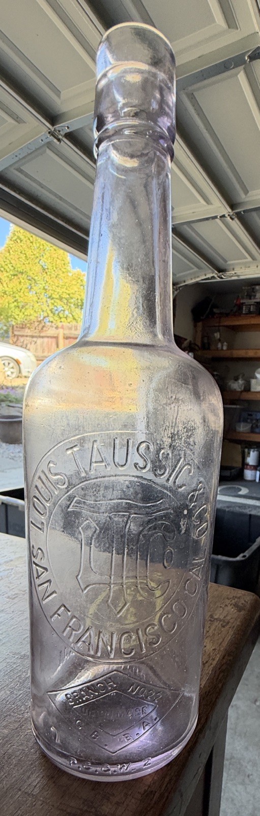 Rare antique amethyst Louis Taussig & Co San Francisco whiskey bottle