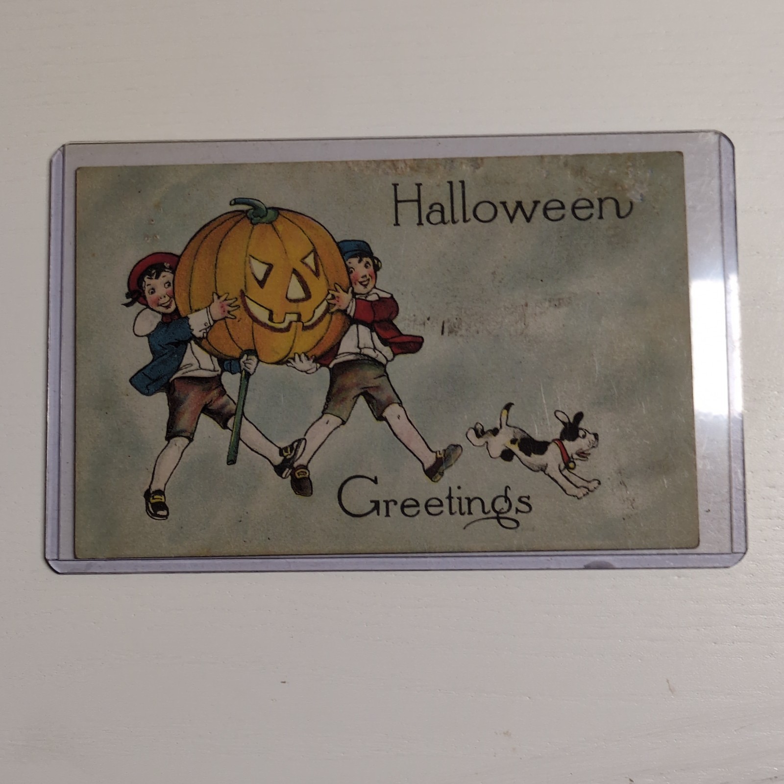 Vintage Halloween Post Card - Boy & Girl Carrying Jack O\' Lantern