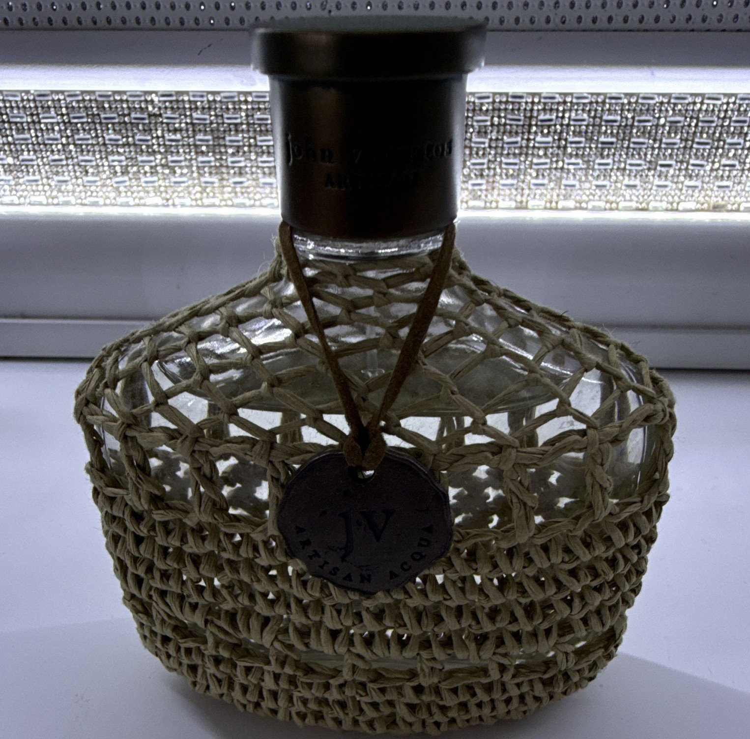 John Varvatos Perfume Bottle with Woven Rattan Covering and Cap