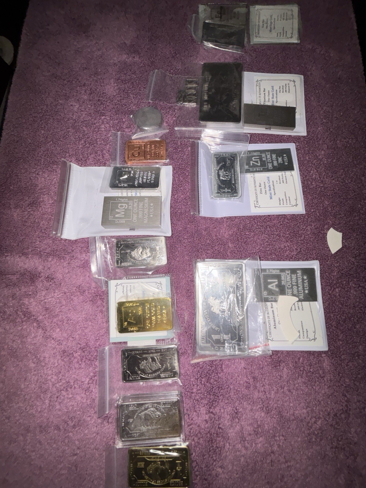Non Precious Metal collection 17 ounce bars and 5 half gram. Sold as a set