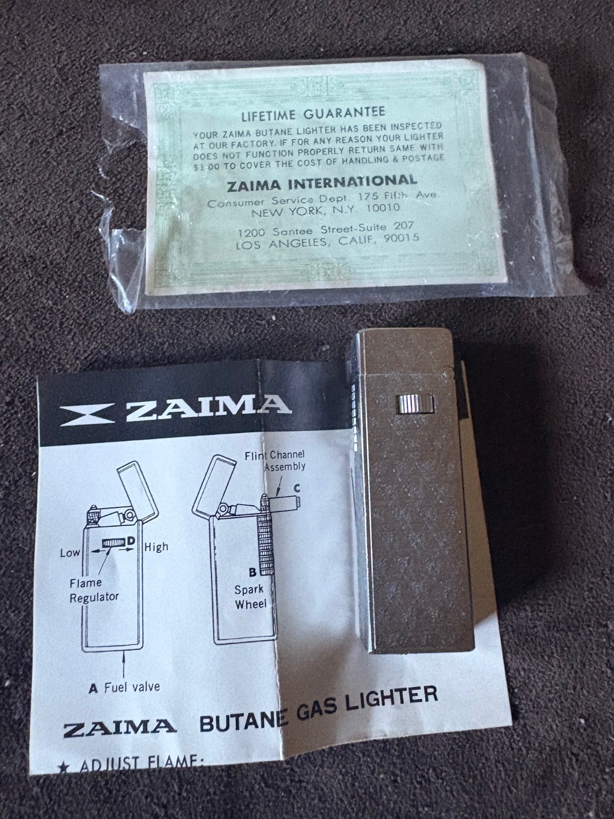 Vintage SIlver Zaima Japan Pocket Lighter w/ Engraved Design + lifetime warranty