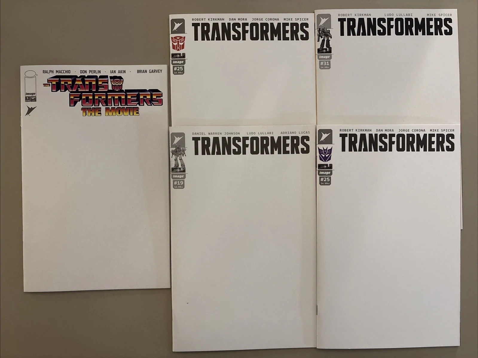 Transformers #19, 25, 25, 31 + 40th Anniversary The Movie #1 Blank Variants Transformers #19, 25, 25, 31 + 40th Anniversary The Movie #1 Blank Variants