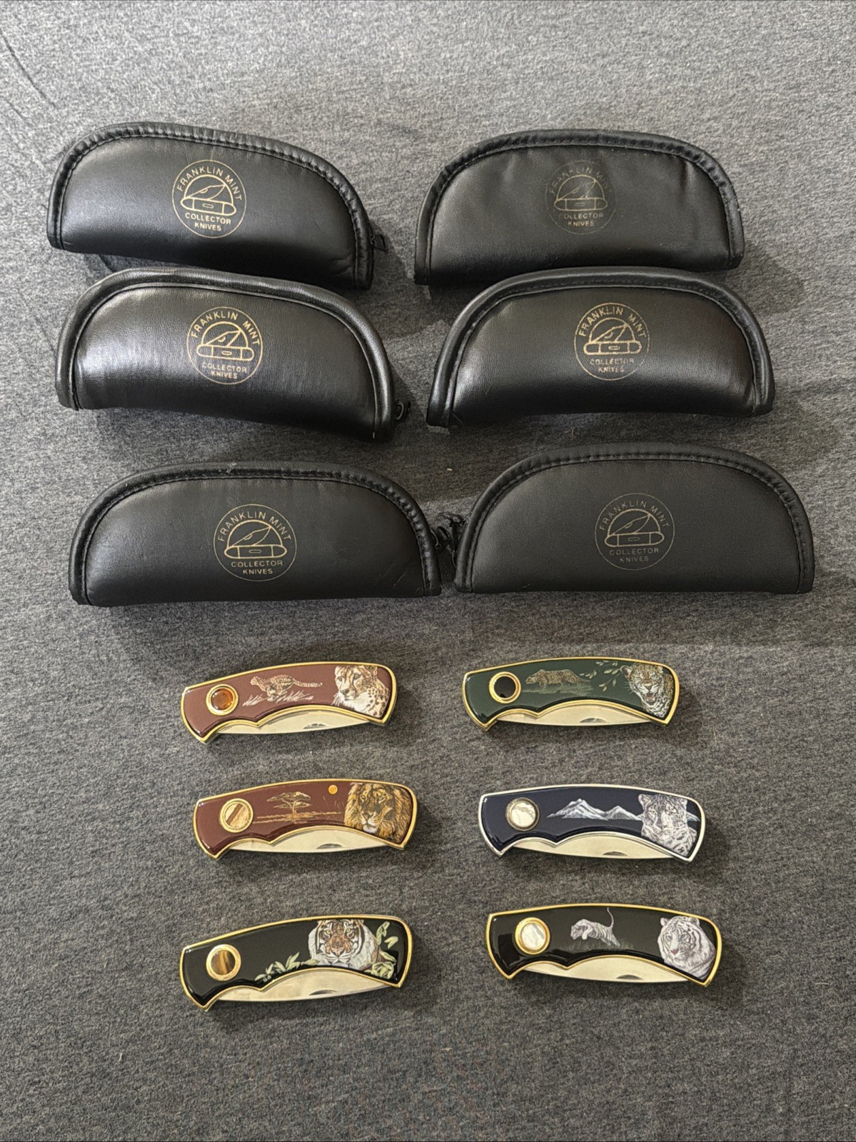 6 Franklin Mint Big Cat collectors Knives with pouches