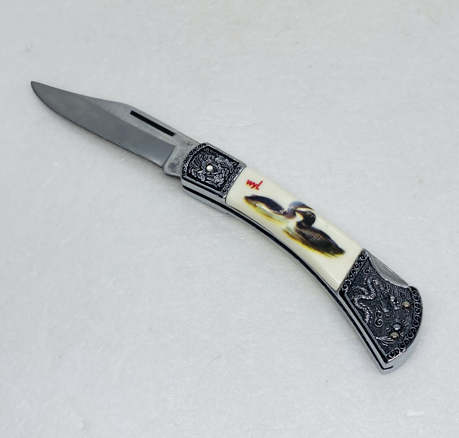 Rare WYL Solid Metal Dragon Handle Pocket Knife Bakelite Duck Art Heavy Duty X