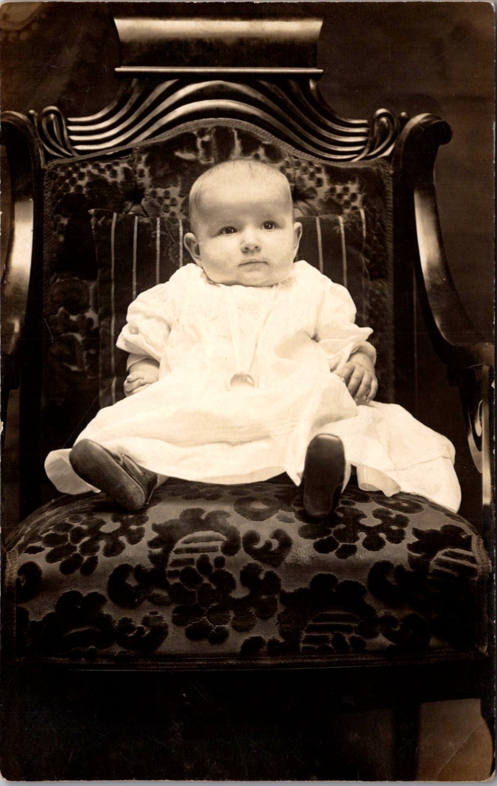 A Baby In White Dress Seated In Ornate Chair RPPC Real Photo Postcard 4P23-5