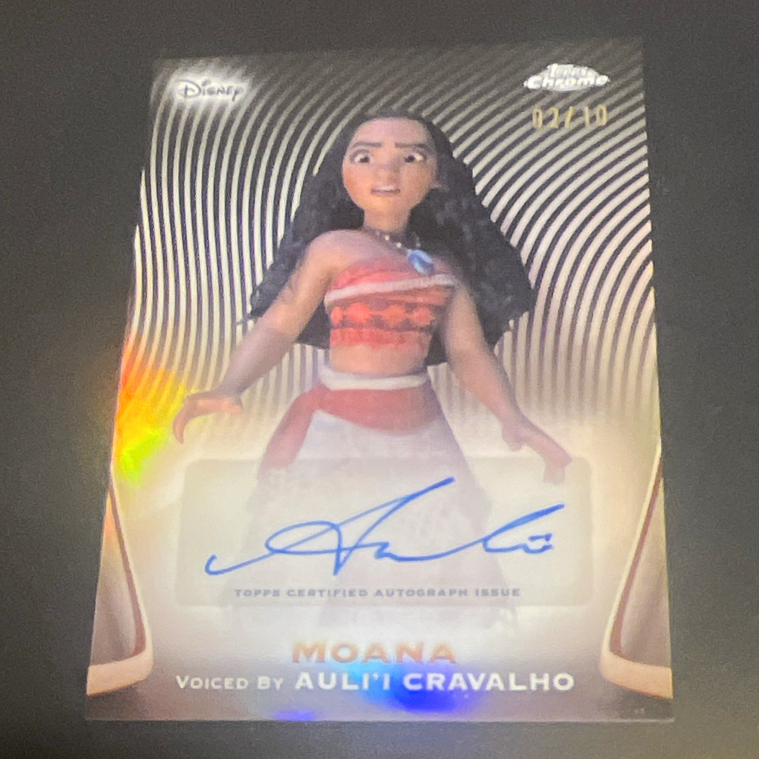 Topps 2025 Disney Chrome Moana AA-AC Auli\'i Cravalho Blk Sapphire Auto 02/10