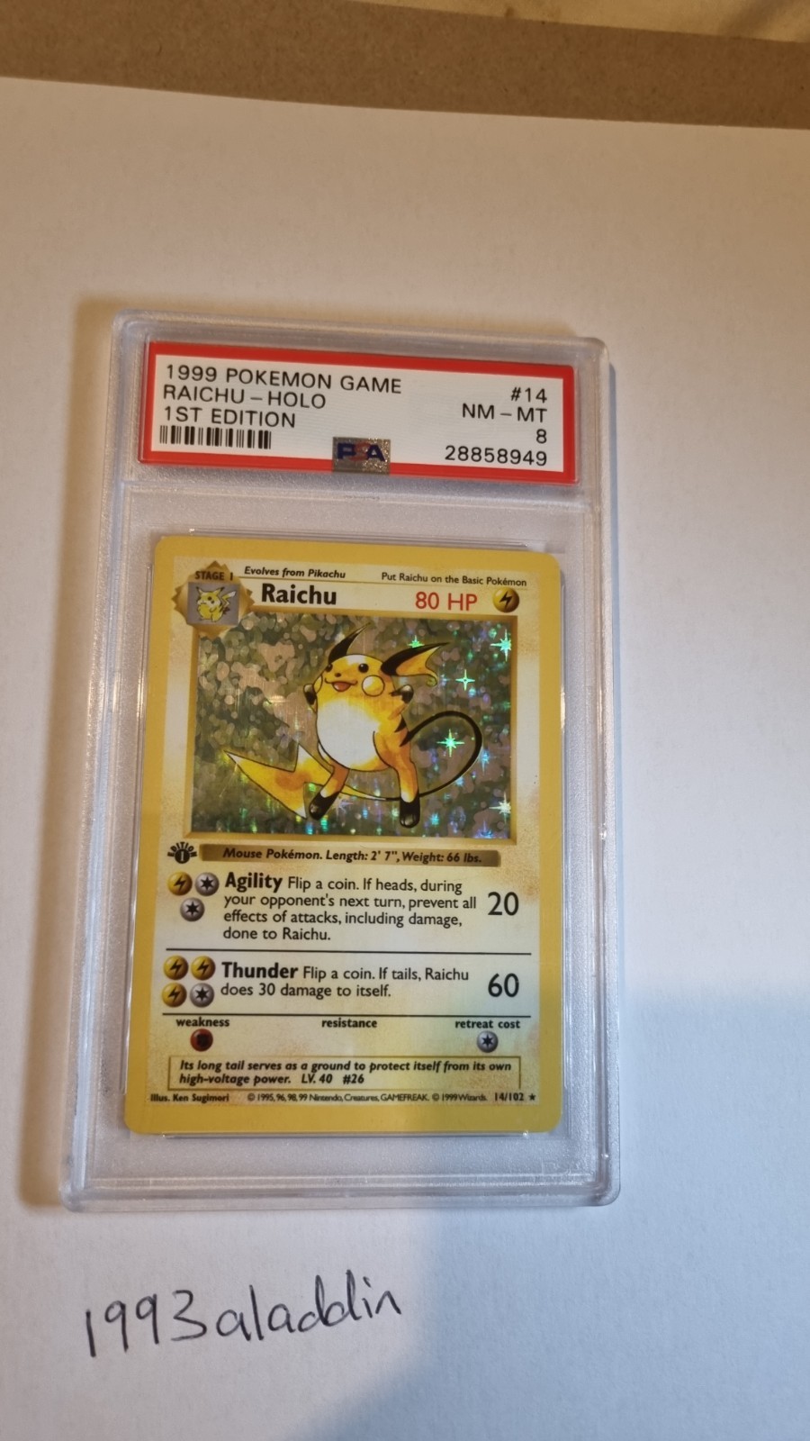 See description Pokémon Base Set Raichu 14/102 1st Edition Shadowless Holo PSA 8